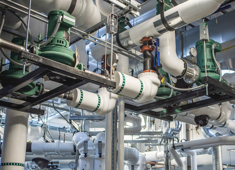 Images of a heating and ventilation system, displaying components such as ducts, vents, and HVAC units that work together to regulate indoor air temperature and quality for comfortable and healthy living and working environments.