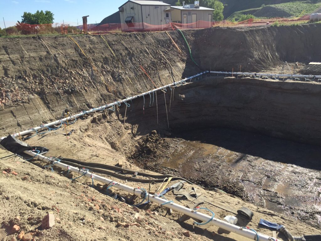 Images demonstrating groundwater dewatering techniques, showcasing the use of pumps and equipment to effectively manage and lower groundwater levels at construction and mining sites for safe and efficient operations.